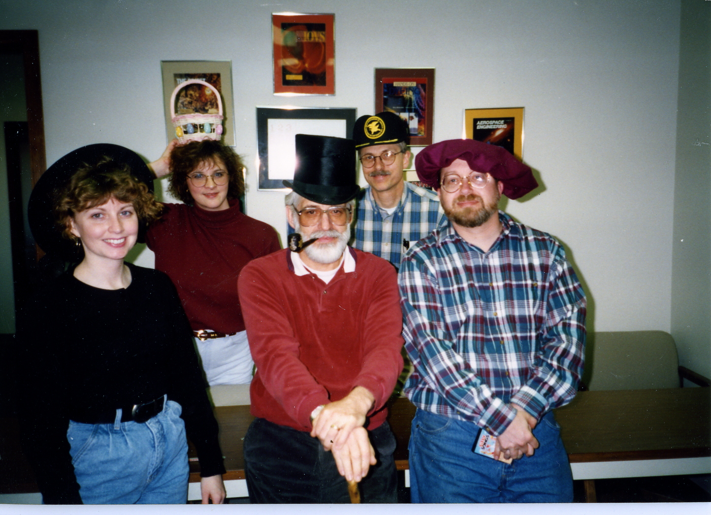 Advantage Computing Systems employees wearing festive Halloween themed hats