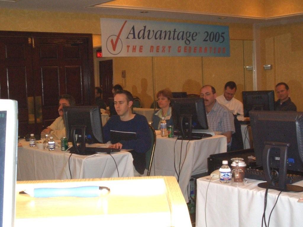 Advantage users are seated at computer terminals for an in-person training session, 2005