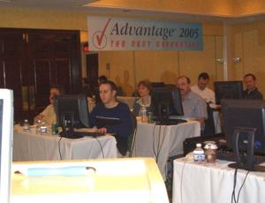 Advantage users are seated at computer terminals for an in-person training session, 2005